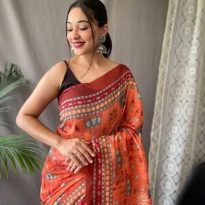Women's Creative Terracotta Orange Linen Saree with Kalamkari Inspired Print & Tassel Detailing – Great for Casual Festivities & Cultural Events